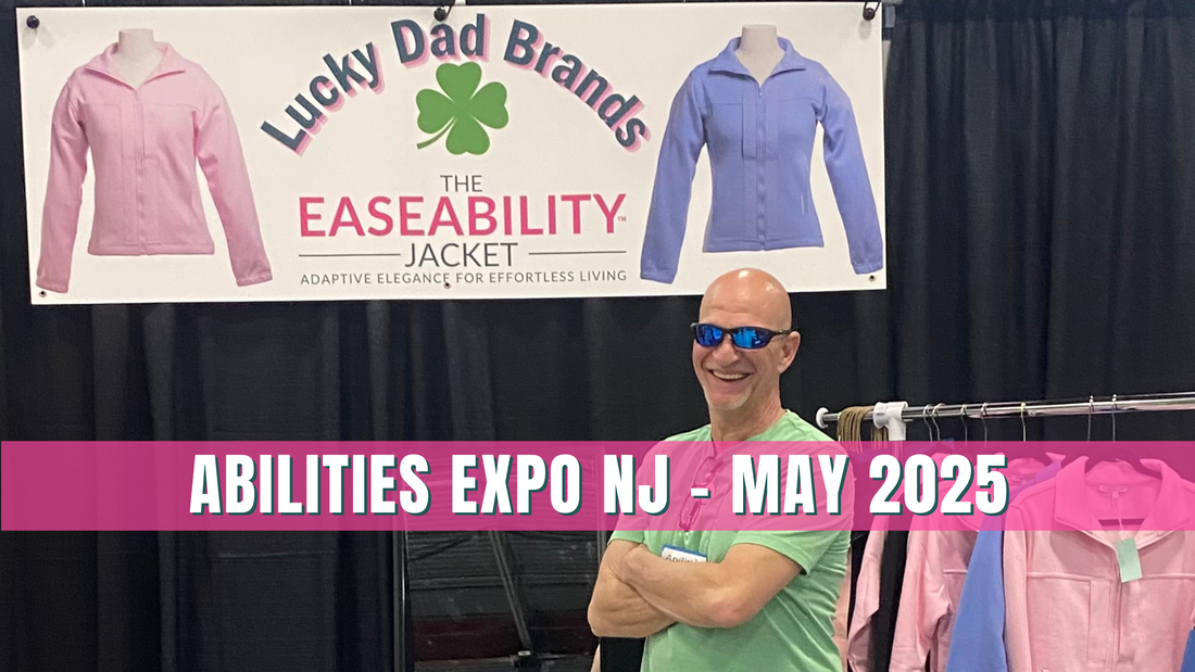 A man stands with his arms crossed triumphantly across his chest in front of clothing on a rack. A banner that reads "Abilities Expo NJ - May 2025" is superimposed over the picture in white writing with a bring pink background. 